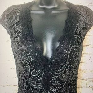 Gorgeous Bebe black and silver dress - size 0